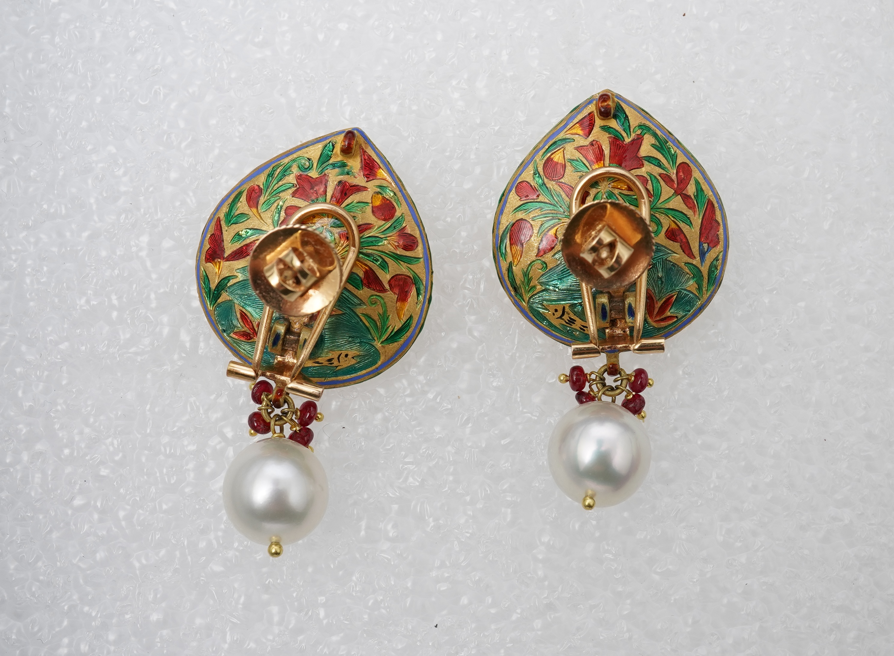 An emerald, ruby, enamel, cultured pearl and diamond demi-parure, India